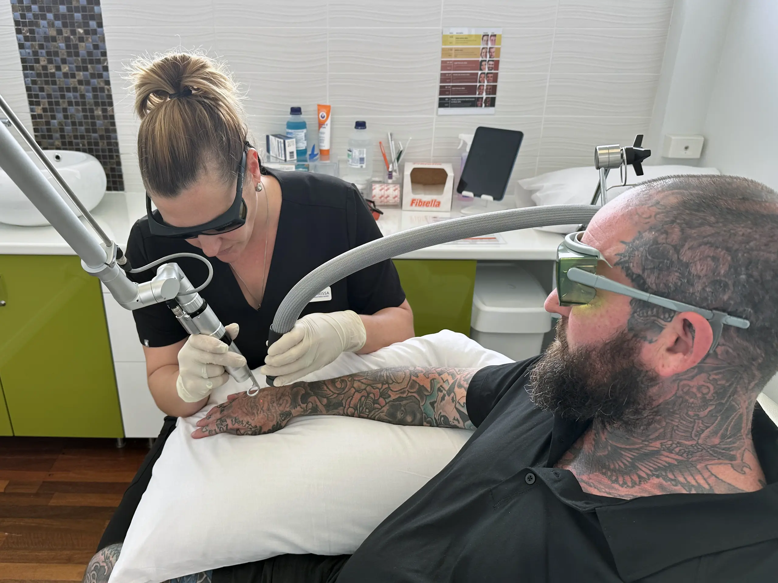 Laser tattoo removal treatment in progress, Perth